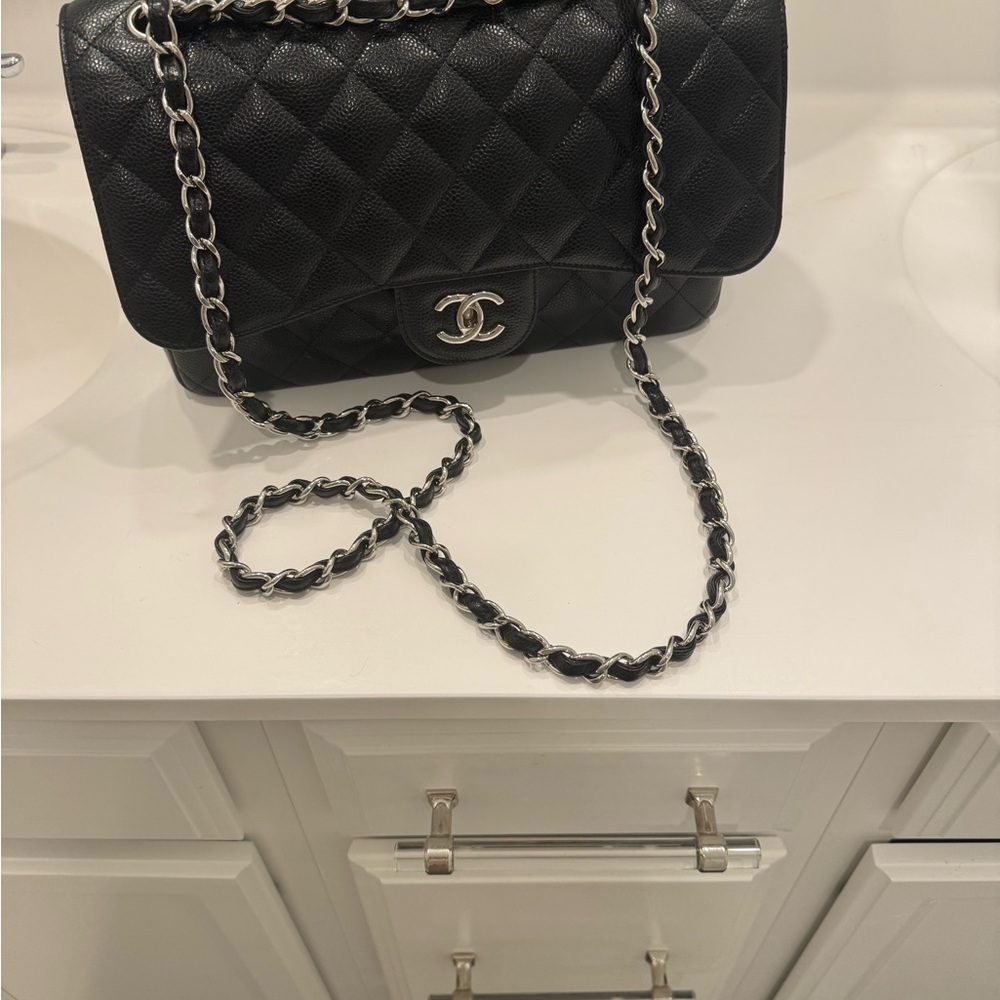 Chanel Black Quilted Shoulder Bag with Iconic CC Closure Silver hardware - Picture 14 of 16
